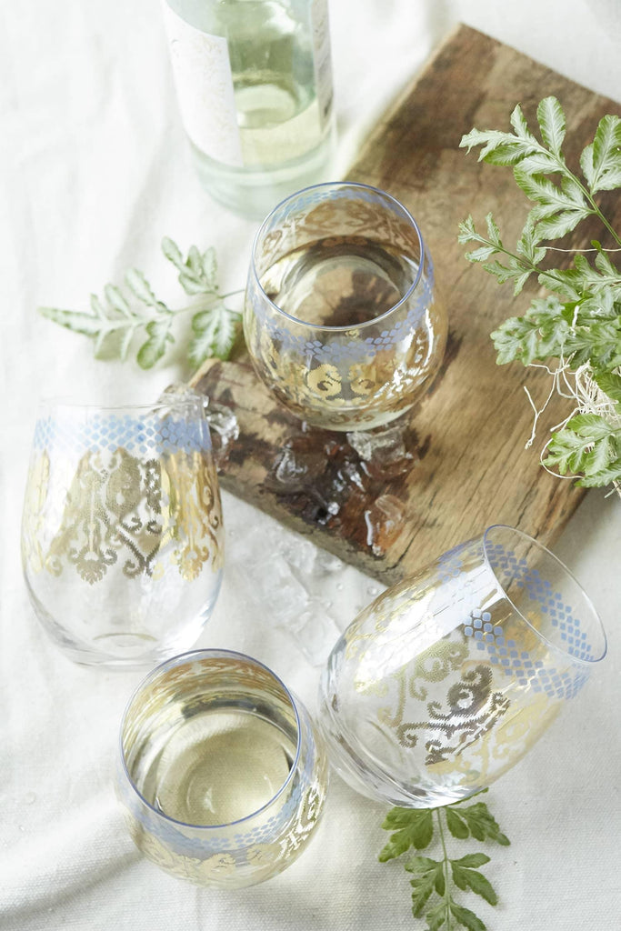 Patina Vie Golden Ikat Stemless Wine Glass on tabletop overhead