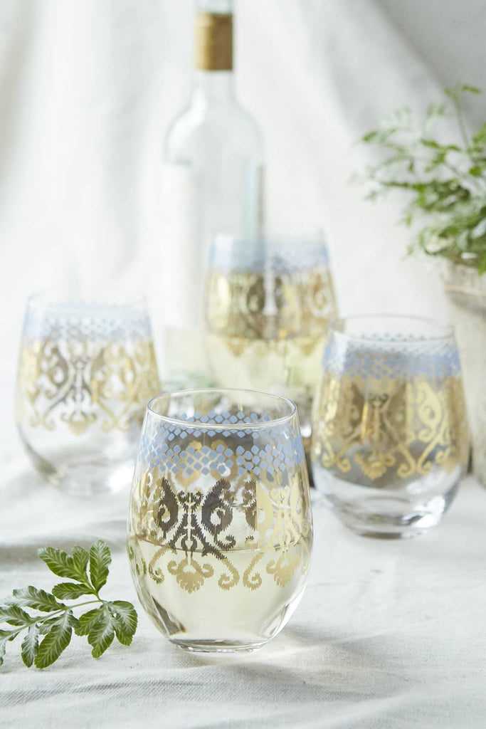 Patina Vie Golden Ikat Stemless Wine Glass on table